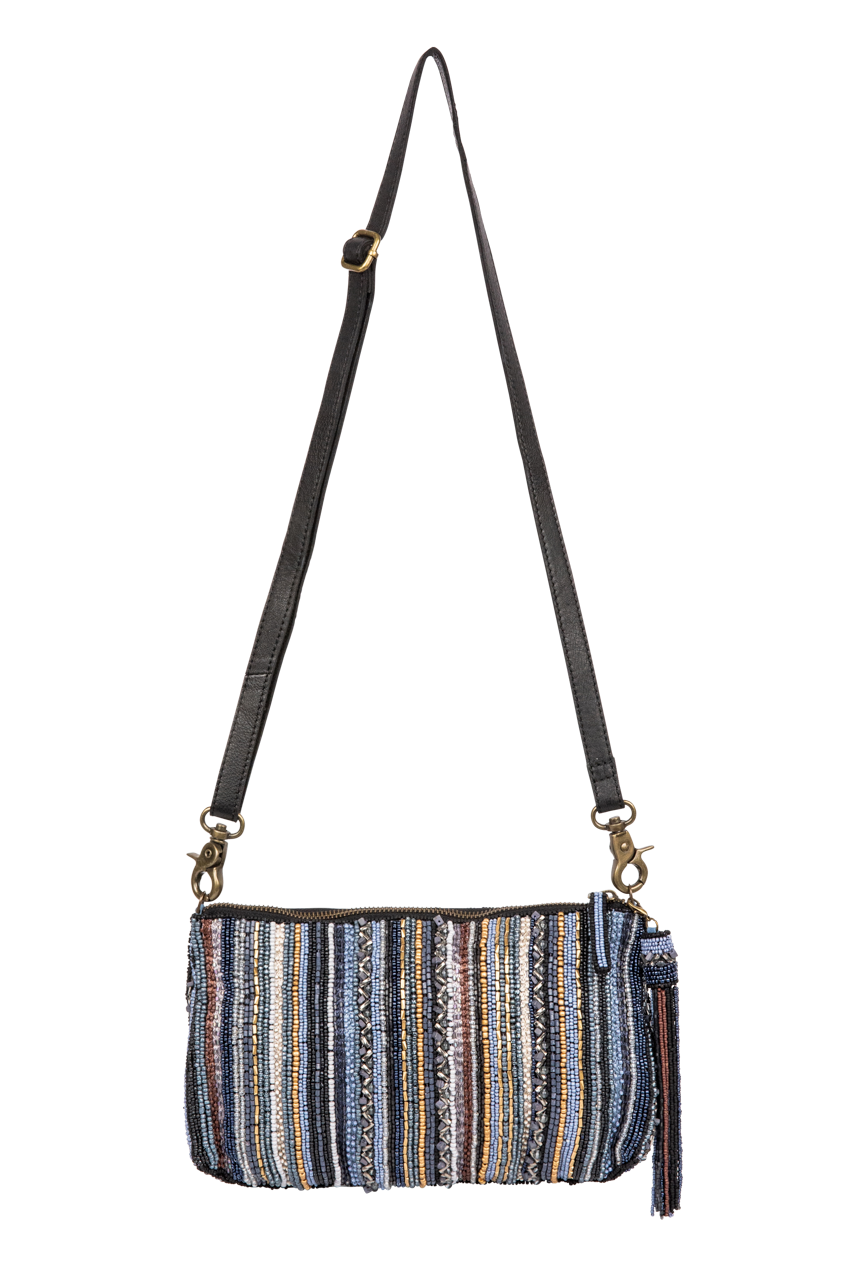Multicolored striped clutch bag with a black strap on a white background