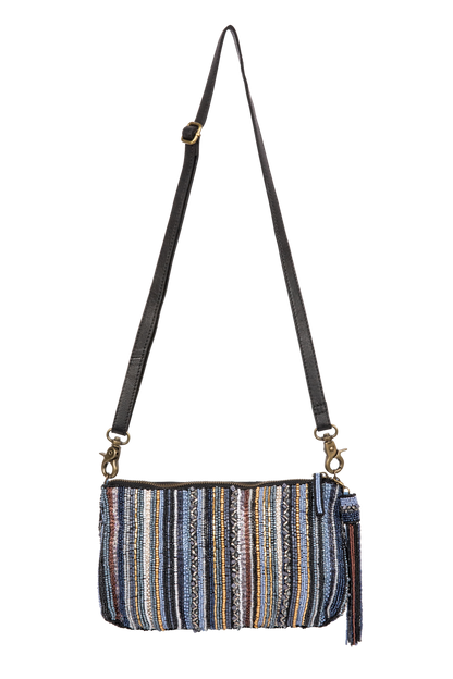 Multicolored striped clutch bag with a black strap on a white background