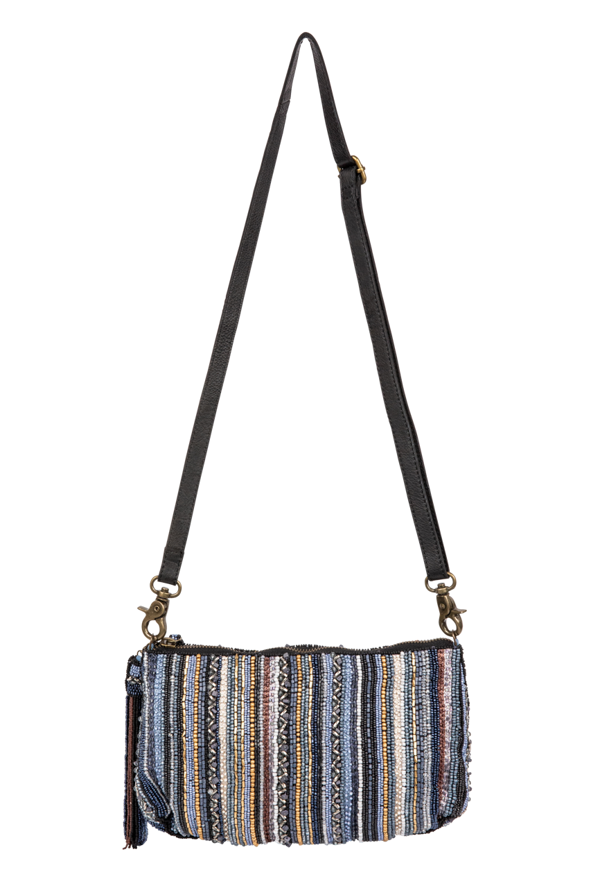 Multicolored striped bag with a black strap on a white background
